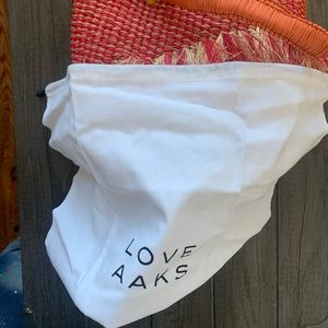 - AAKS Tia Raffia Bucket bag